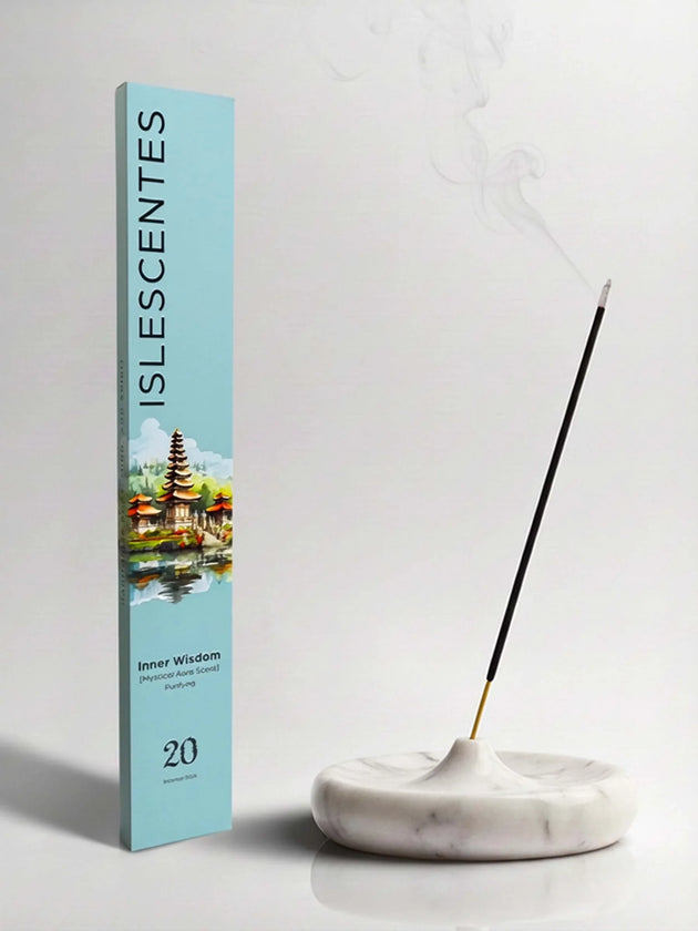 Islescentes Inner Wisdom Mystical Aura Scent Luxury Incense Sticks in mint green packaging with smoldering stick on marble holder