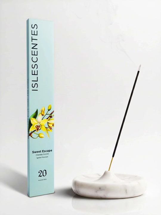 Islescentes Sweet Escape Vanilla Scent Luxury Incense Sticks in mint green packaging with smoldering stick on marble holder